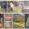 Tám ứng dụng chiếu ký hiệu xuống sàn kho và nhà xưởng: biển STOP, cảnh báo xe nâng, vạch đi bộ và vạch phân làn bằng ánh sáng